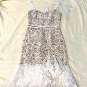 Size 4 women’s white dress, brand new with tag